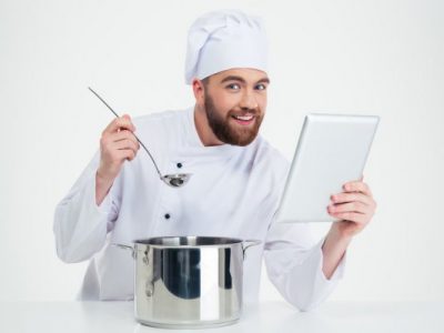 depositphotos_85235012-stock-photo-male-chef-cook-holding-digital
